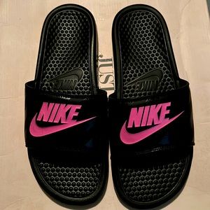 Women’s black Nike Slides